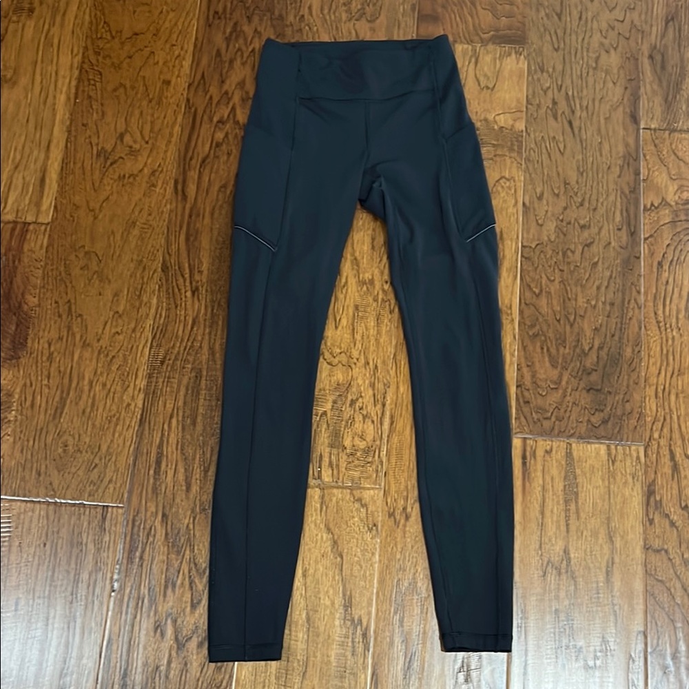 Lululemon Fast and Free Black High-Waisted Leggings size 2, 25” with back zipper